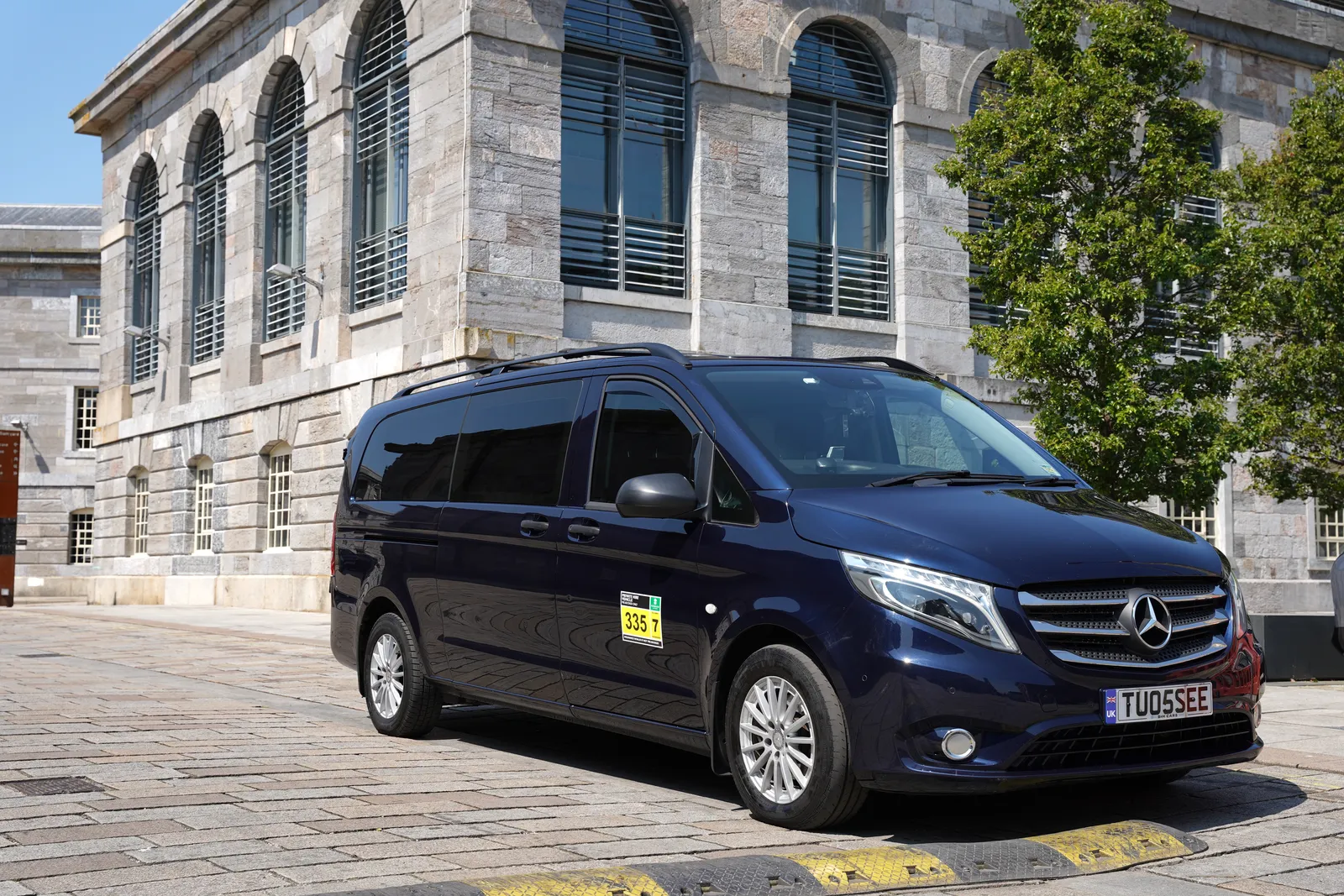Group transfer vans by city hall